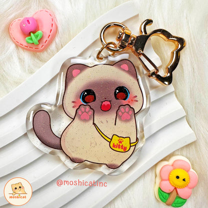Kitty lick lick glitter keychain